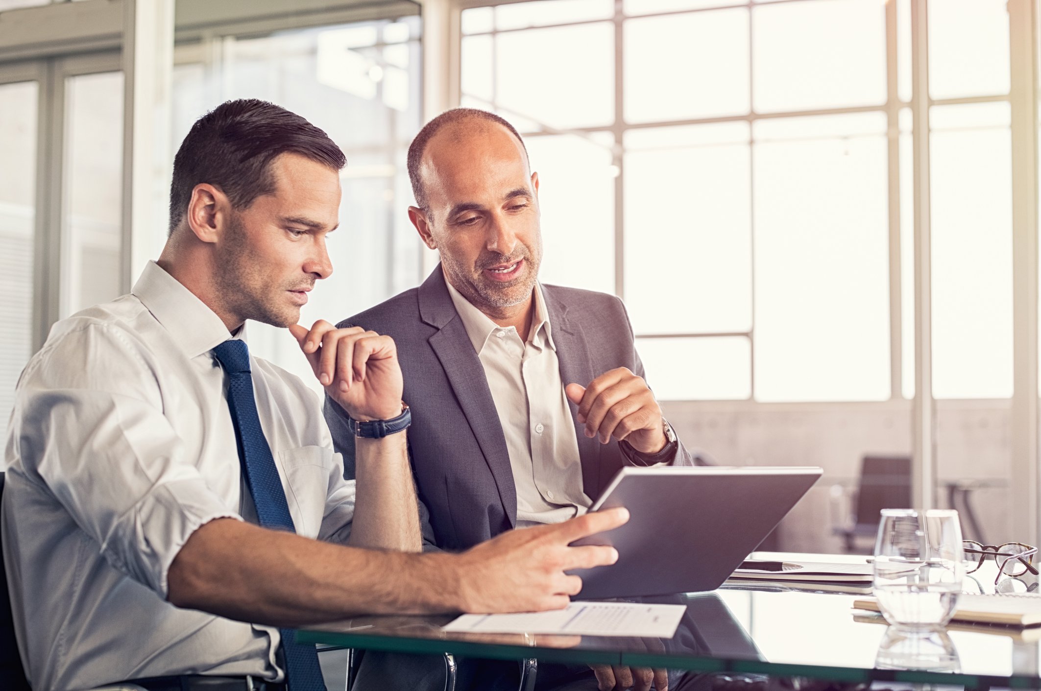 businessmen using tablet